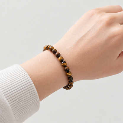 4 mm tiger’s eye bracelet on a relaxed wrist, without a pointing finger